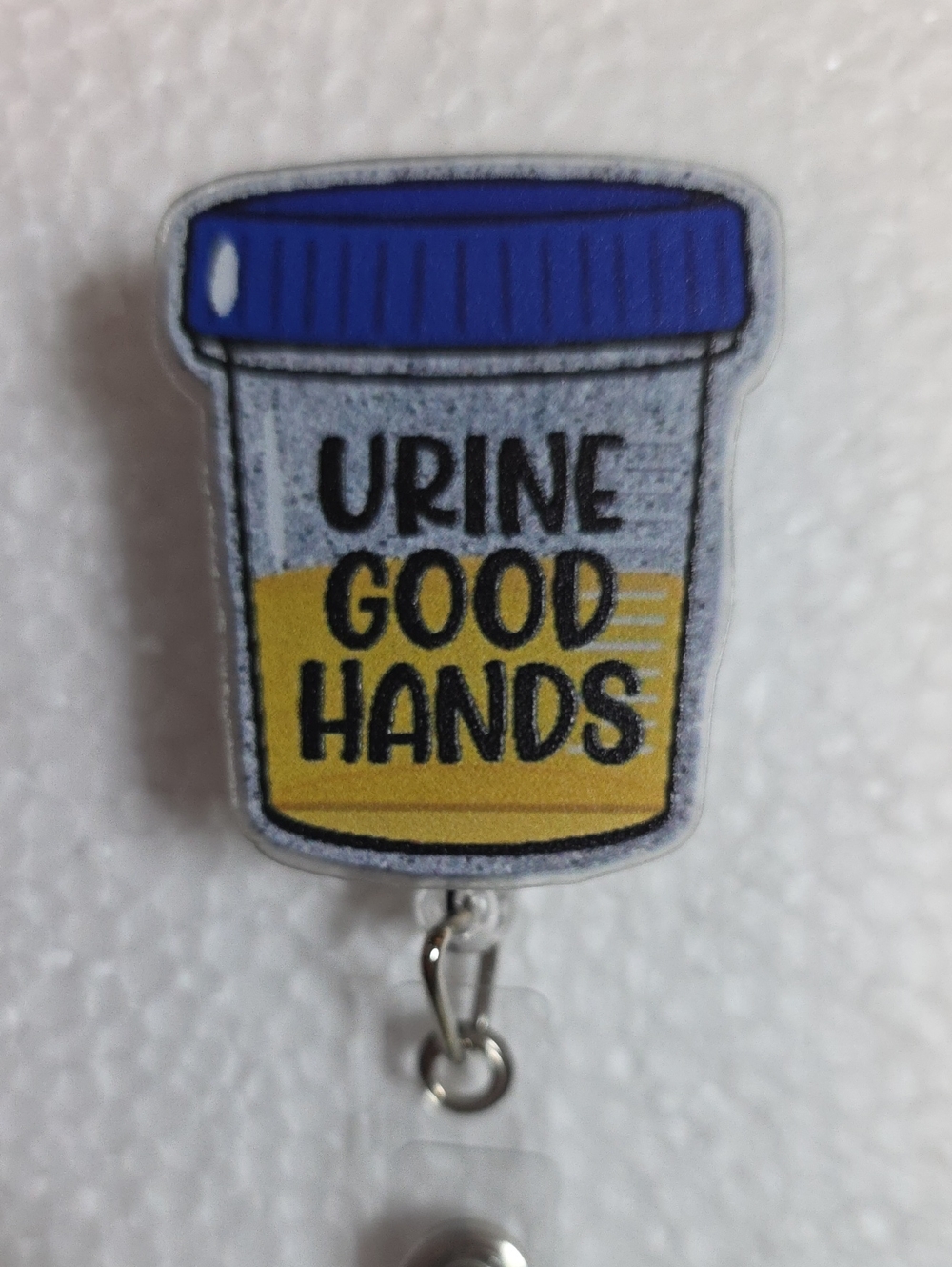 Urine Good Hands Badge Reel